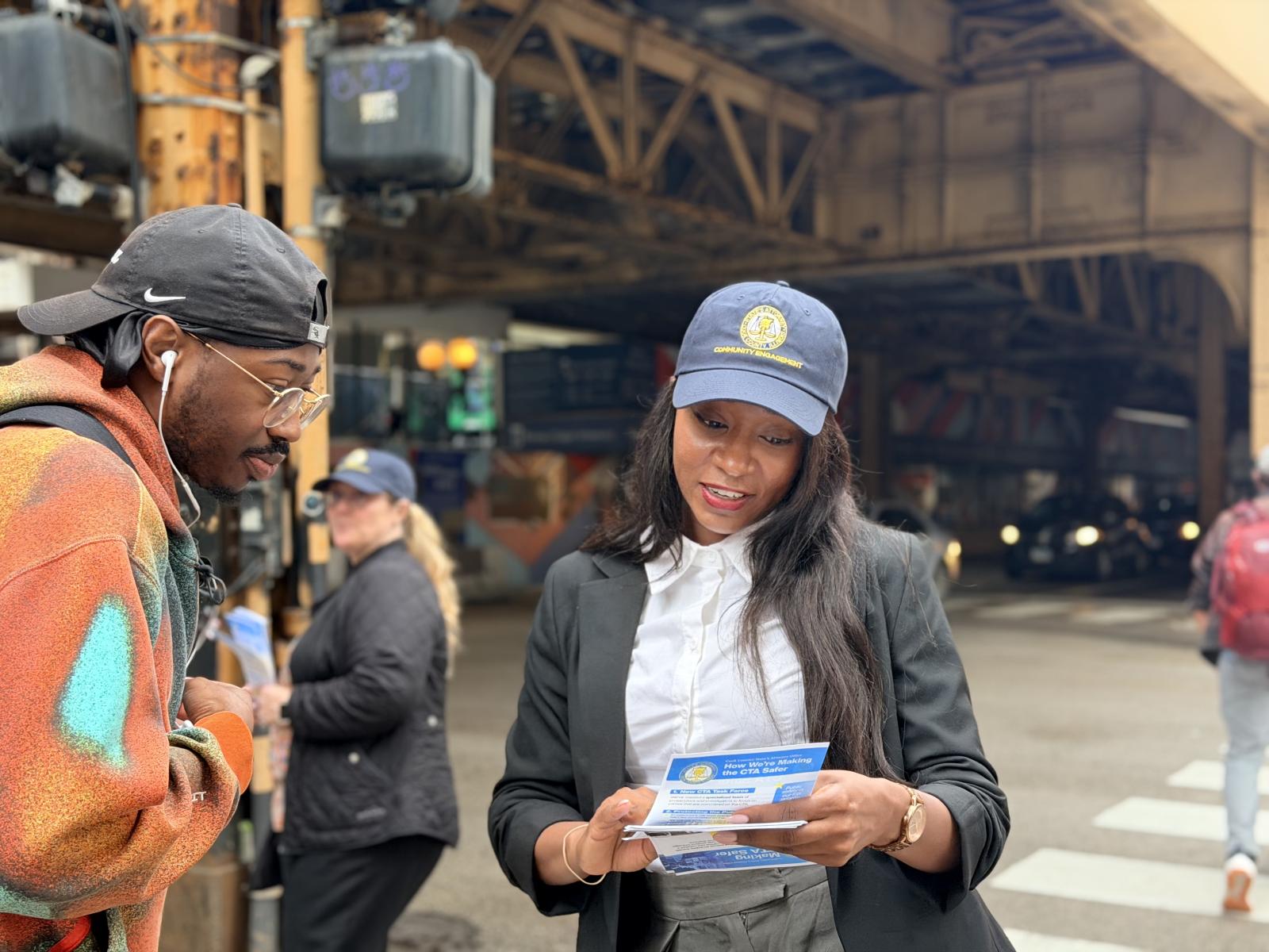 Members of the Community Engagement team speak to community members about CTA Safety.